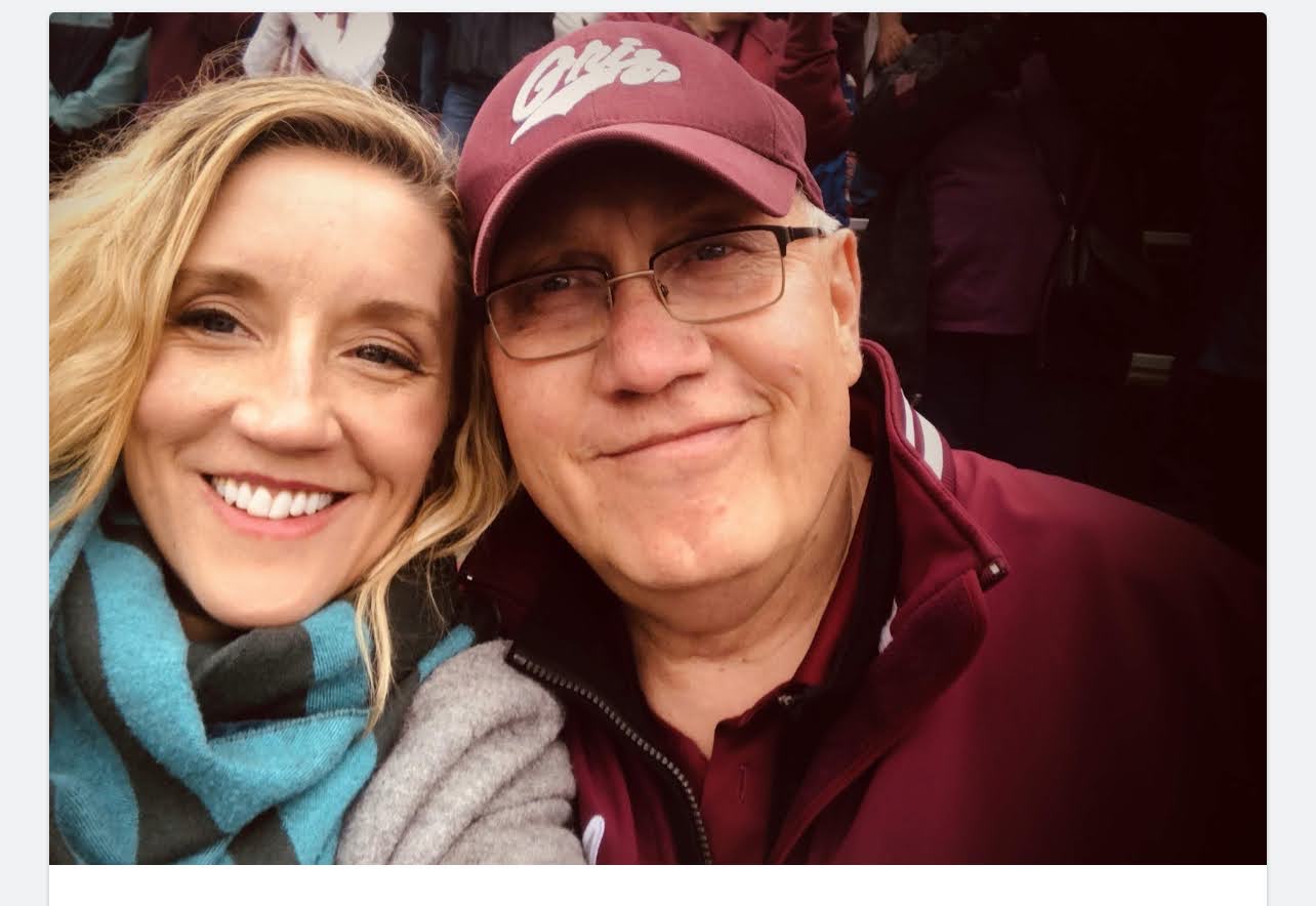 Charmagne and her father, Bob Gauthier, together at a Griz game